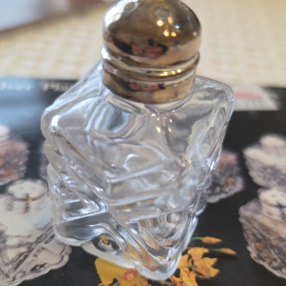 19 Individual Salt/ Pepper Shakers.